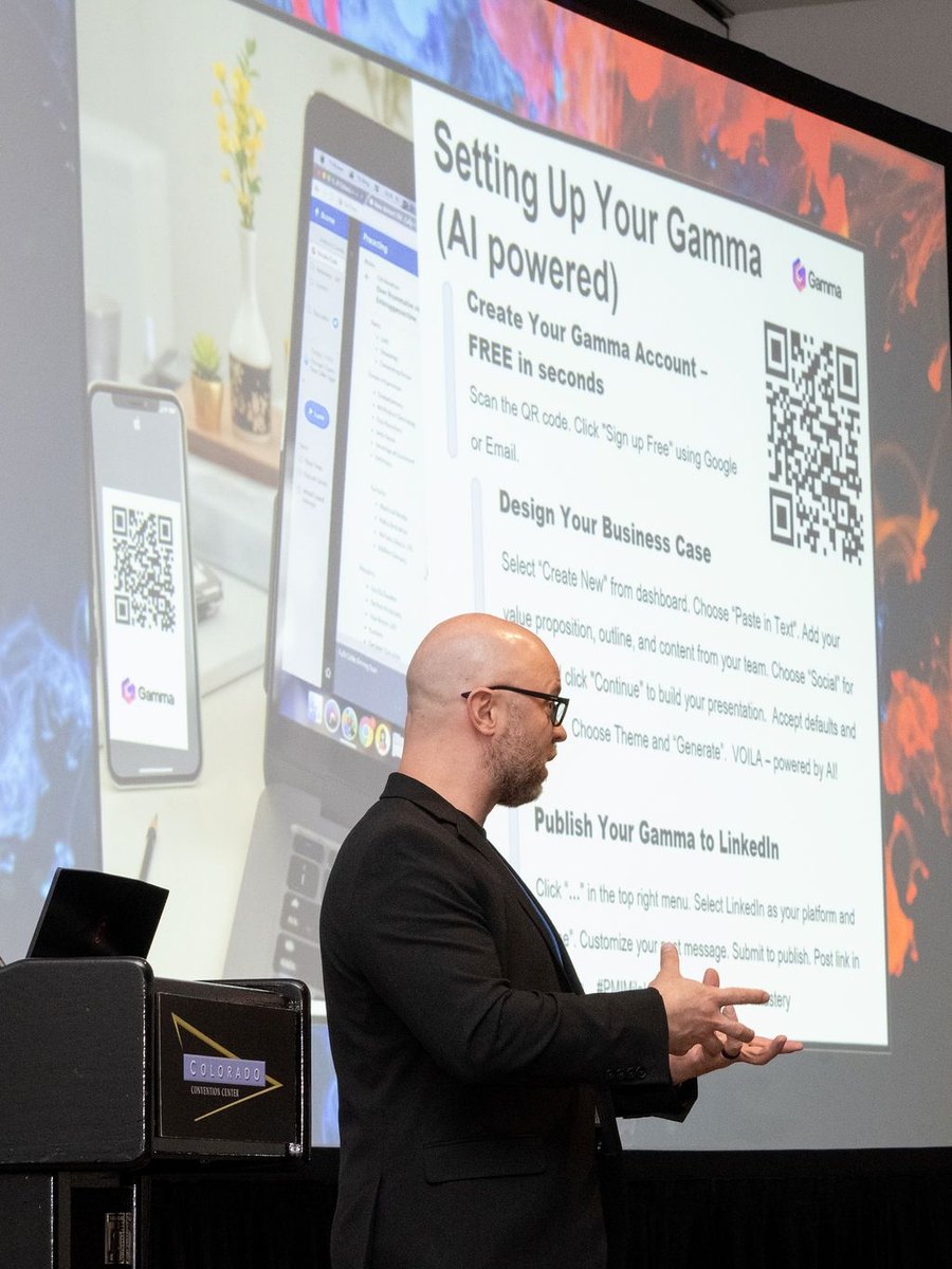Presenting on stage at the Rocky Mountain Project Management Symposium